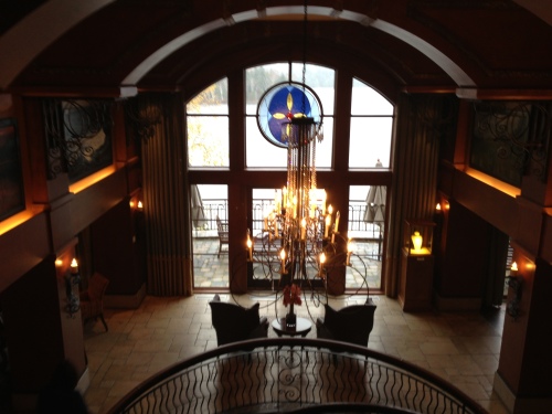 The lobby of  Mont Tremblant's Hotel Quintessence offers a portal to Lac Tremblant and its surrounding forrest.
